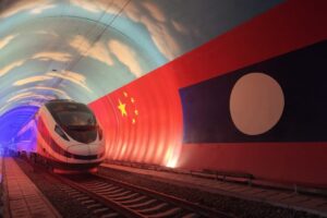 The Lane Xang EMU train passes by the China-Laos borderline inside a tunnel, October 15, 2021. /Xinhua